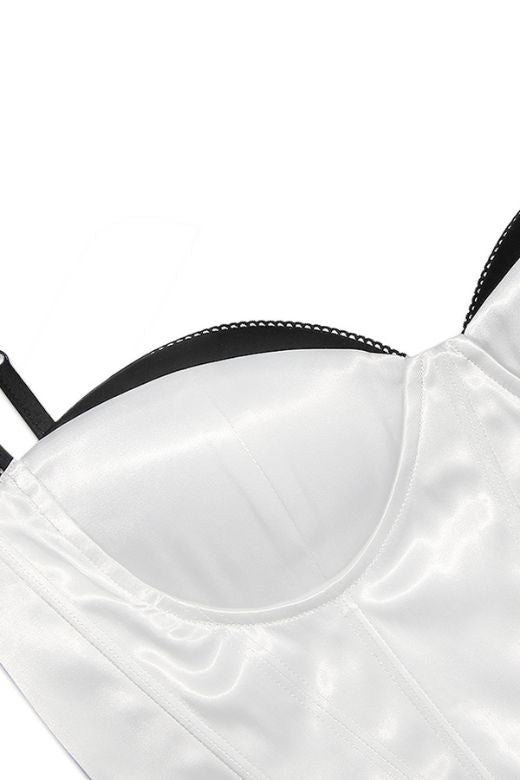 Woman wearing a figure flattering Diana Corset Crop Top - Pearl White BODYCON COLLECTION