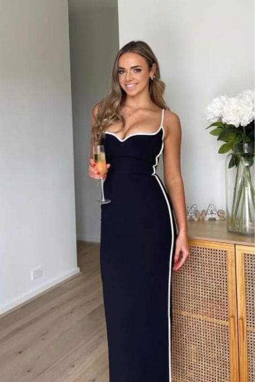 Woman wearing a figure flattering Dianne Bandage Maxi Dress - Classic Black BODYCON COLLECTION