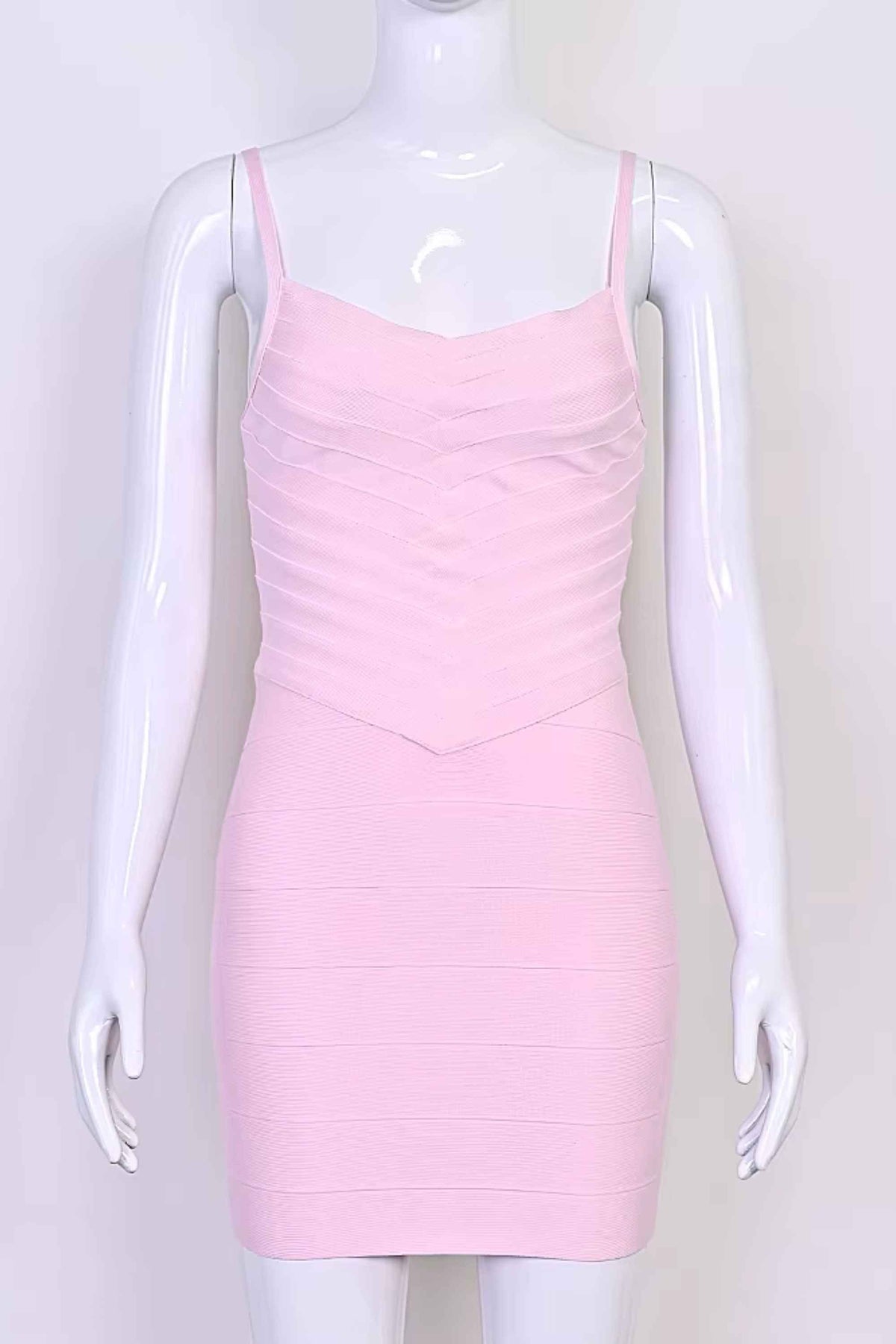Woman wearing a figure flattering Dom Bandage Mini Dress - Dusty Pink BODYCON COLLECTION Pty Ltd