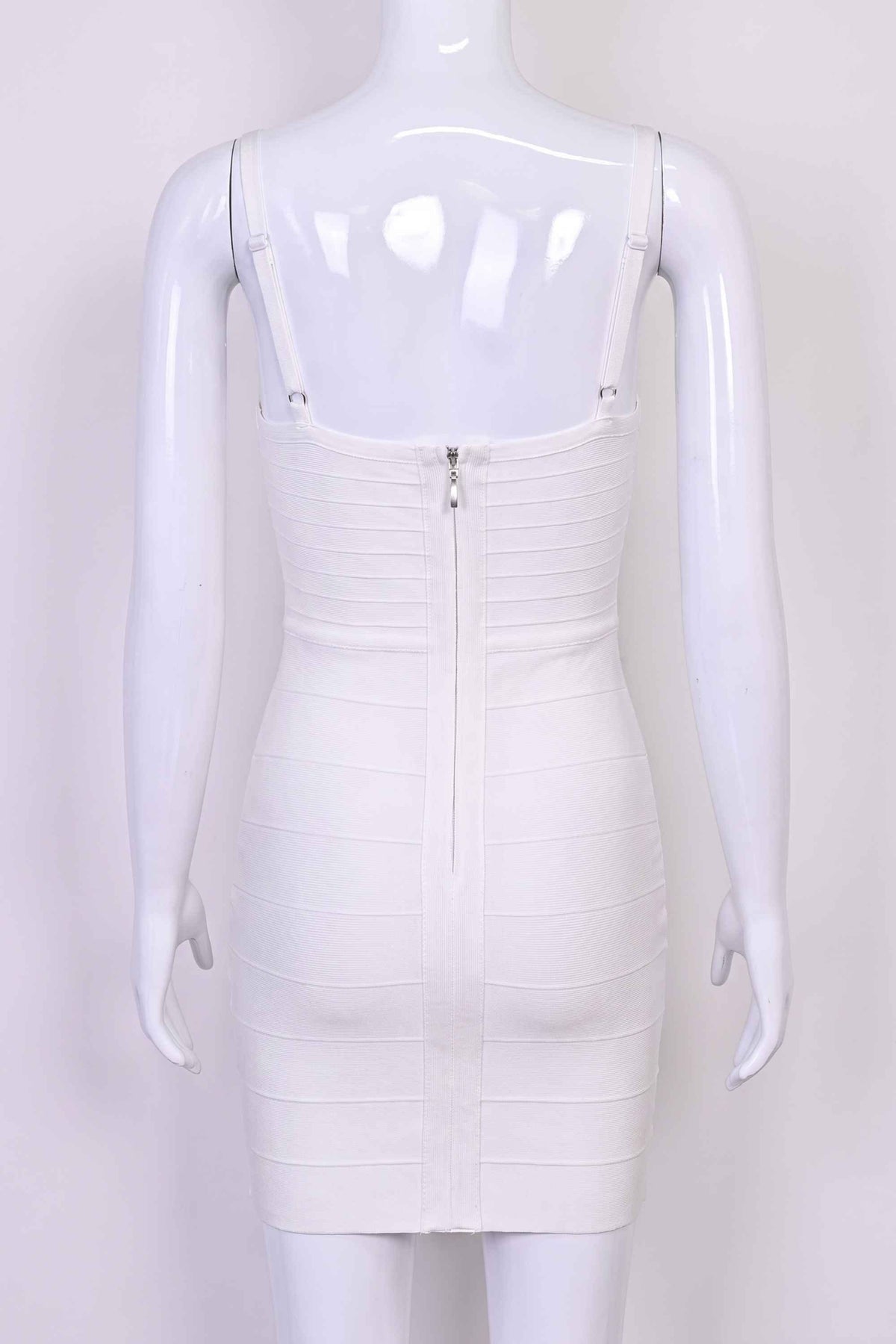 Woman wearing a figure flattering Dom Bandage Mini Dress - White Pearl BODYCON COLLECTION Pty Ltd