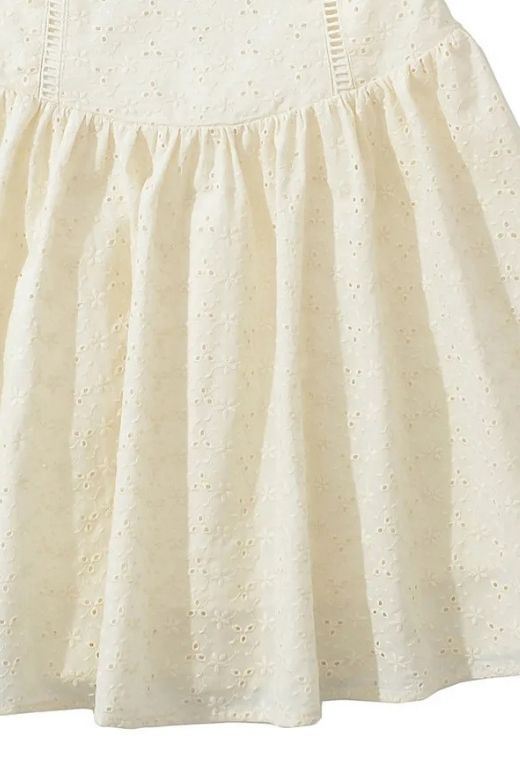 Woman wearing a figure flattering Dovie Bodycon Mini Dress - White Pearl BODYCON COLLECTION Pty Ltd