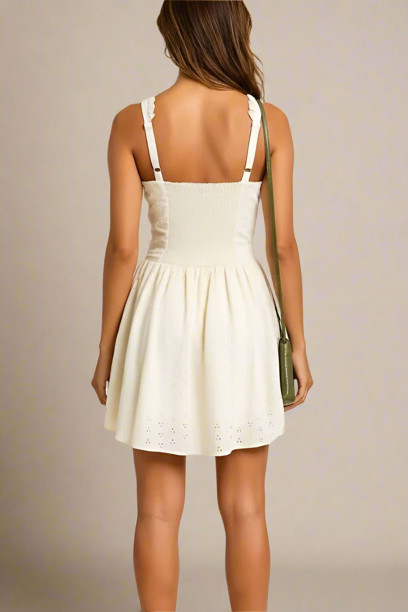 Woman wearing a figure flattering Dovie Bodycon Mini Dress - White Pearl BODYCON COLLECTION Pty Ltd