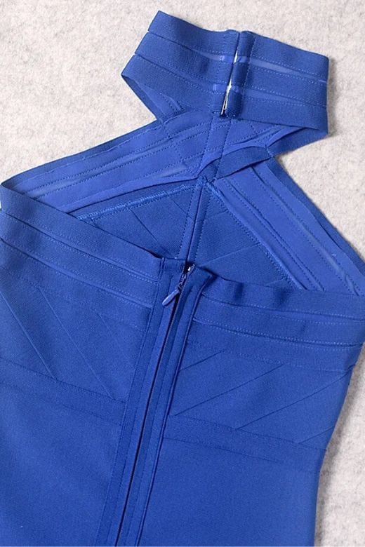 Woman wearing a figure flattering Eden Bandage Dress - Royal Blue BODYCON COLLECTION
