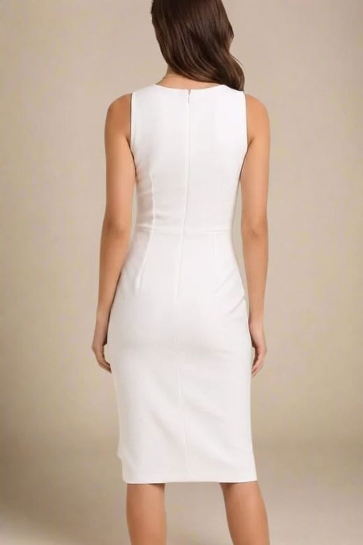Woman wearing a figure flattering Elsa Bodycon Dress - White Pearl BODYCON COLLECTION Pty Ltd