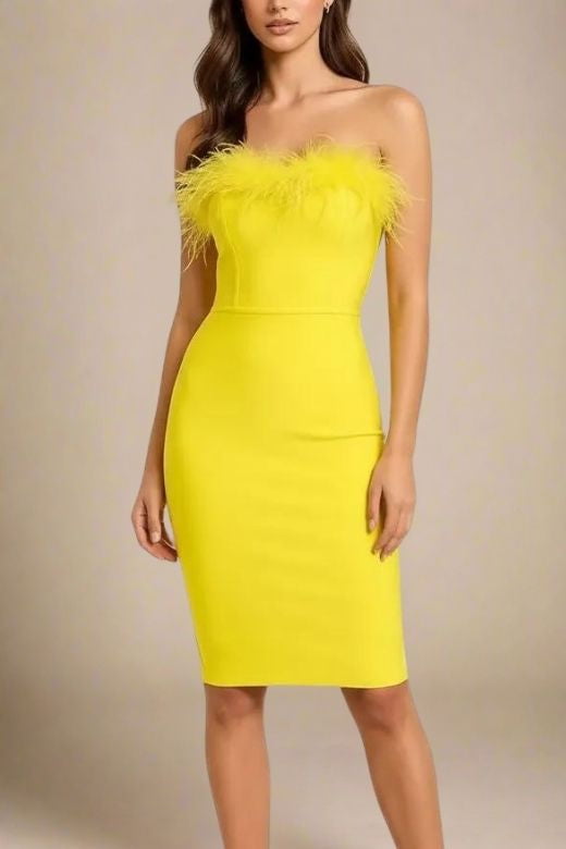 Woman wearing a figure flattering Erin Bandage Dress - Sun Yellow BODYCON COLLECTION