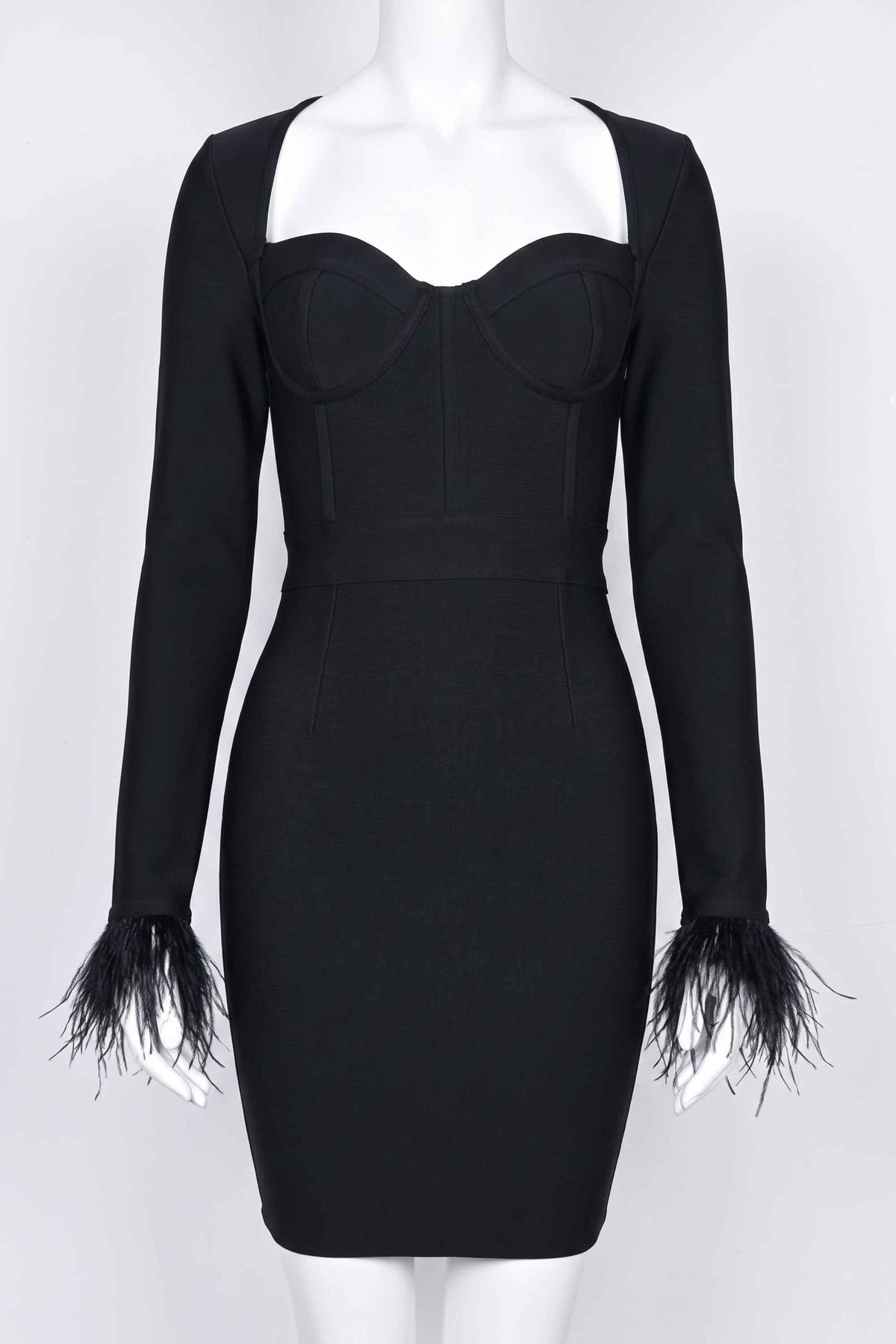 Woman wearing a figure flattering Erin Long Sleeve Bandage Mini Dress - Classic Black BODYCON COLLECTION