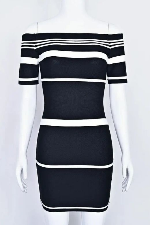 Woman wearing a figure flattering Evelyn Bandage Mini Dress - Classic Black BODYCON COLLECTION Pty Ltd