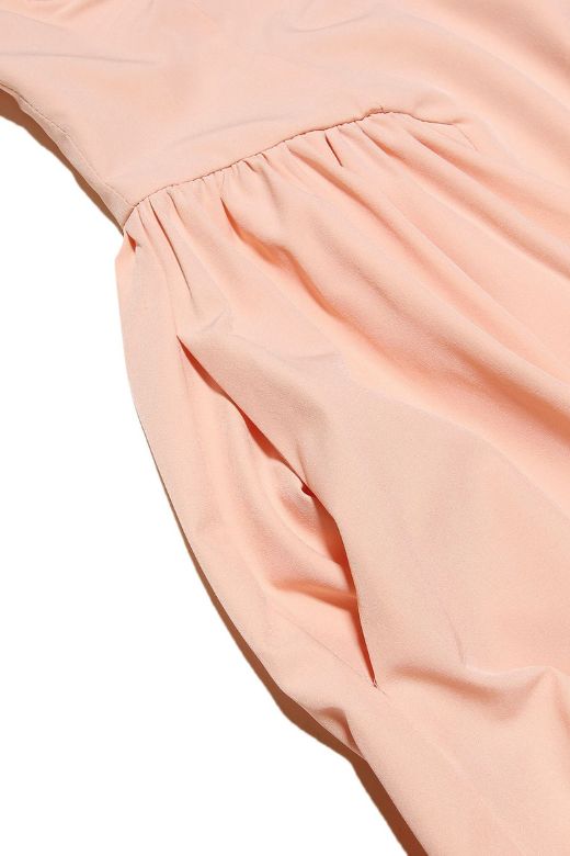 Woman wearing a figure flattering Everly Bodycon Day Midi Dress - Peach BODYCON COLLECTION