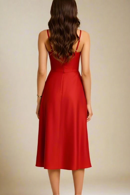 Woman wearing a figure flattering Everly Midi Dress - Lipstick Red BODYCON COLLECTION