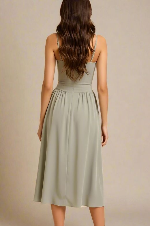 Woman wearing a figure flattering  Everly Midi Dress - Sage Green BODYCON COLLECTION