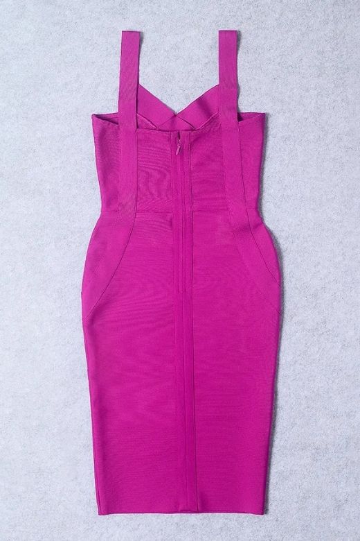 Woman wearing a figure flattering Freya Bandage Dress - Magenta Pink BODYCON COLLECTION