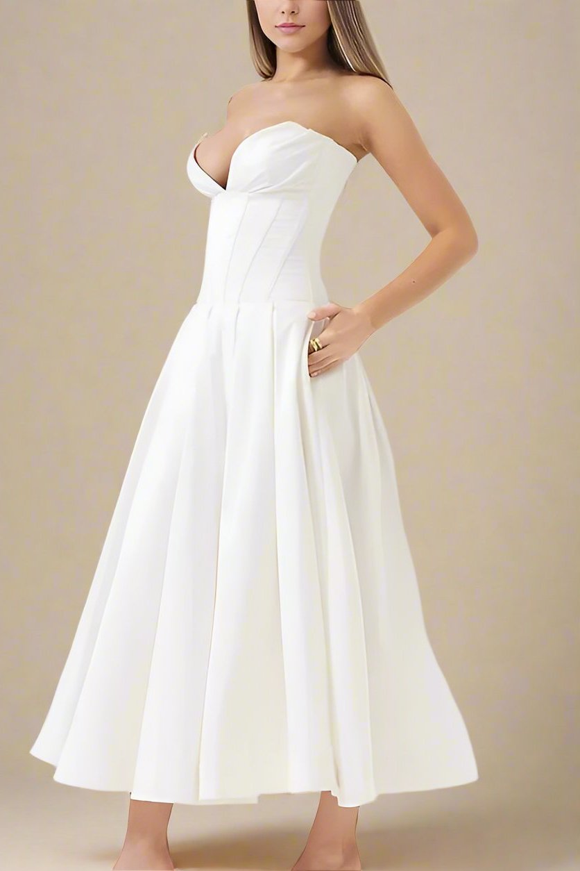 Woman wearing a figure flattering Gabbi Bodycon Midi Dress - Pearl White BODYCON COLLECTION