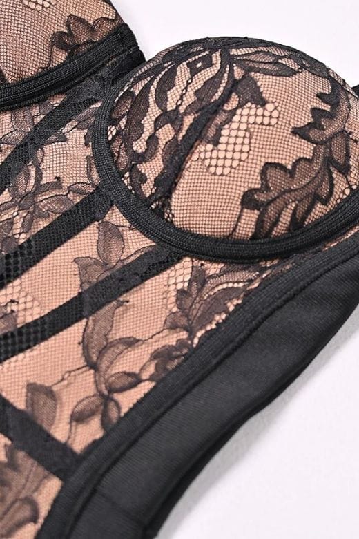 Woman wearing a figure flattering  Genevieve Bodycon Lace Midi Dress - Classic Black BODYCON COLLECTION