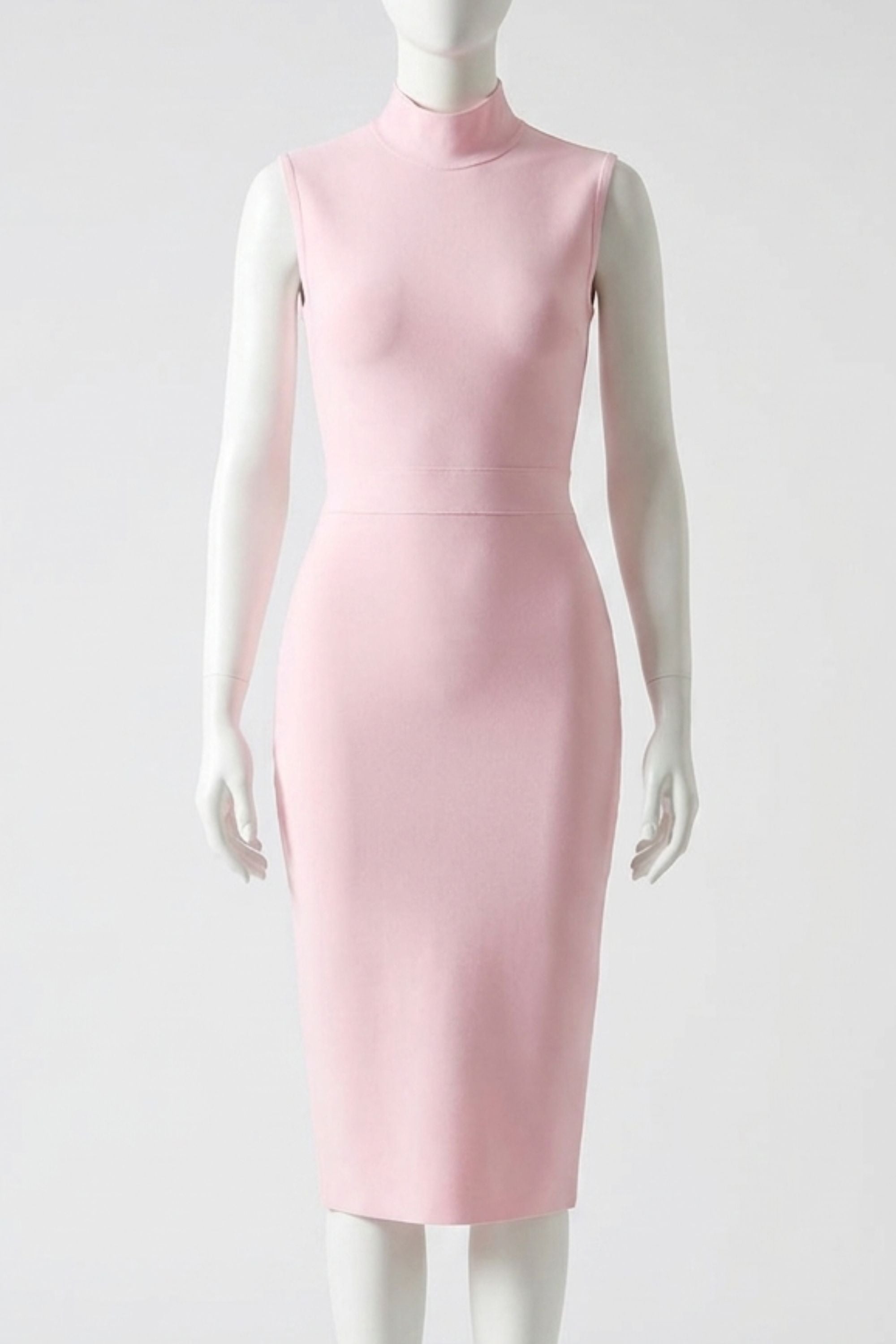 Woman wearing a figure flattering Grace Bandage Midi Dress - Dusty Pink Bodycon Collection