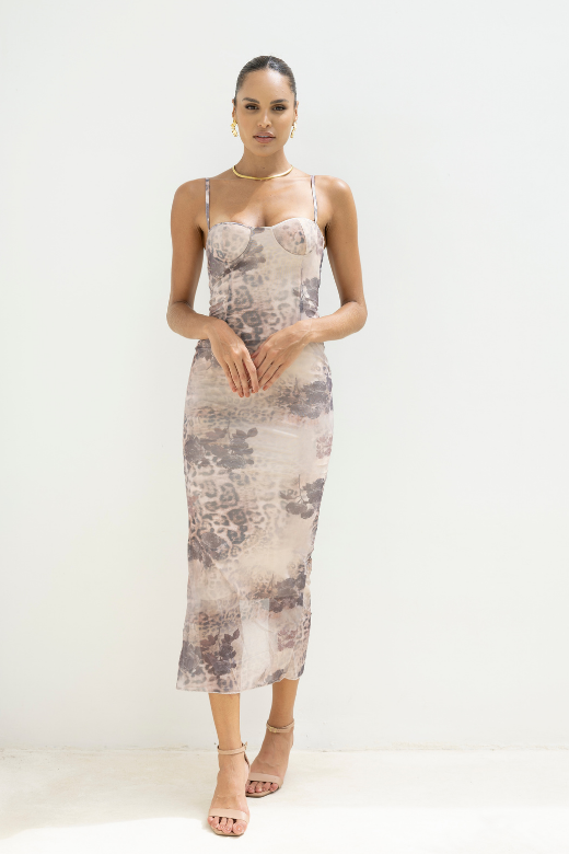 Woman wearing a figure flattering Harmony Bodycon Midi Dress - Nude BODYCON COLLECTION