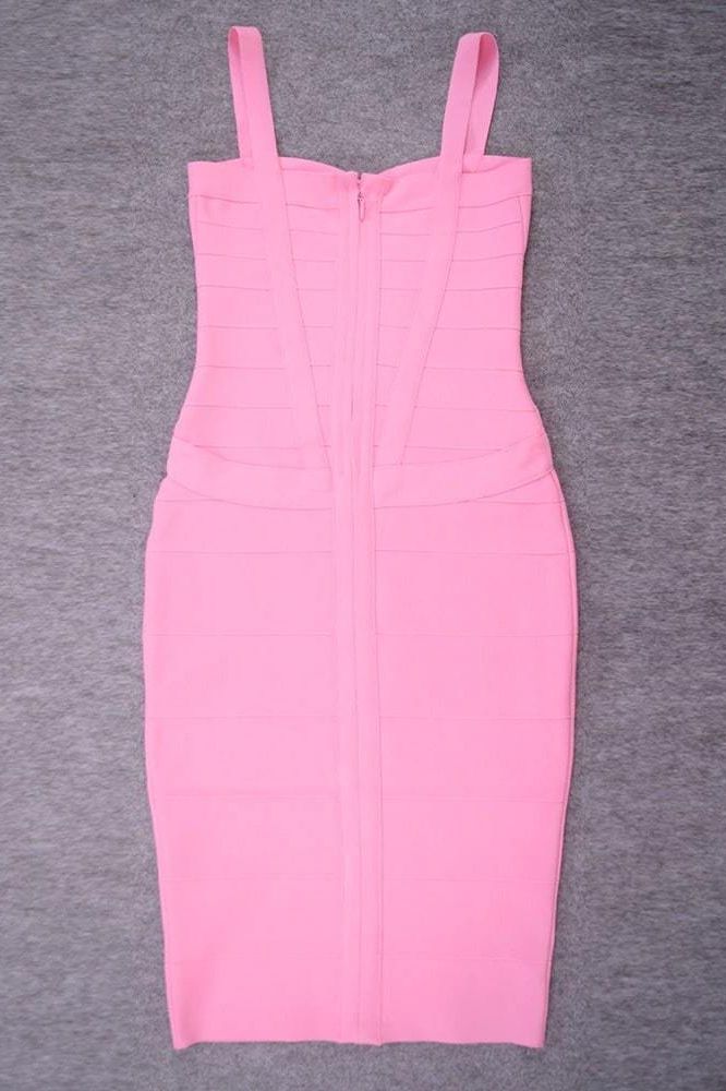 Woman wearing a figure flattering Heidi Bandage Midi Dress - Dusty Pink Bodycon Collection