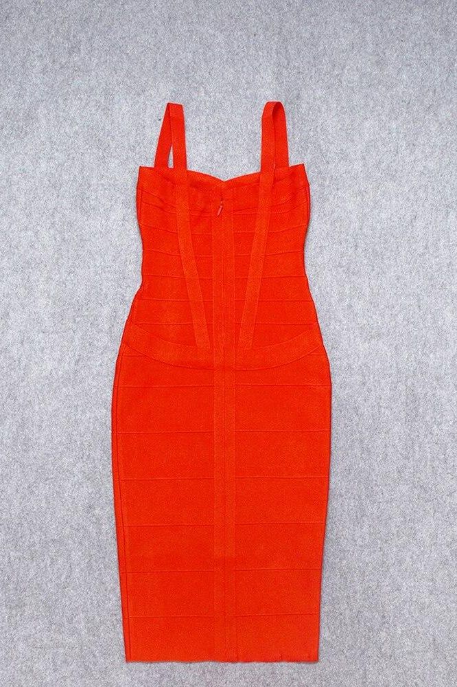 Woman wearing a figure flattering Heidi Bandage Midi Dress - Lipstick Red Bodycon Collection