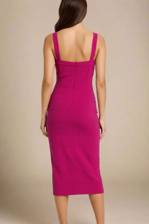 Woman wearing a figure flattering Heidi Bandage Midi Dress - Magenta Pink Bodycon Collection