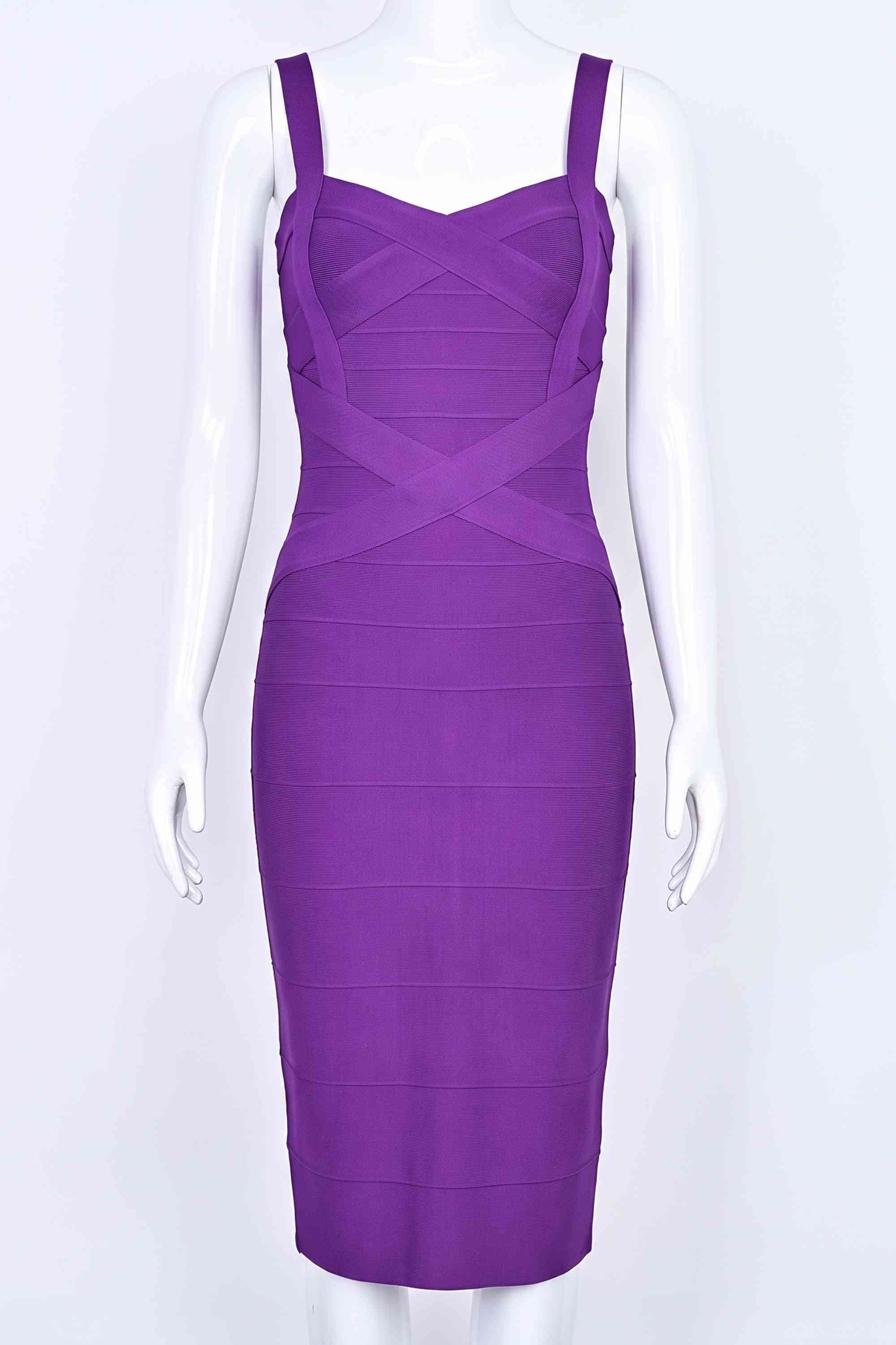 Woman wearing a figure flattering Heidi Bandage Midi Dress - Plum Purple Bodycon Collection
