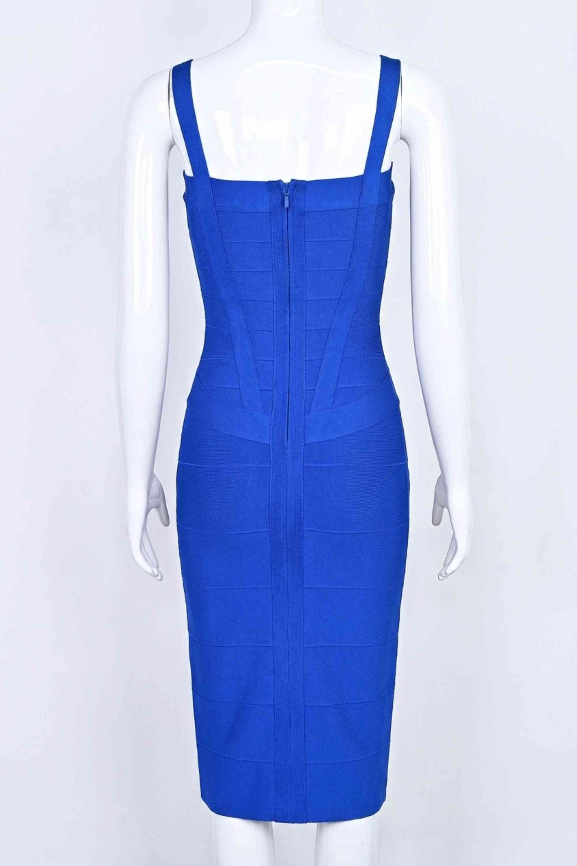 Woman wearing a figure flattering Heidi Bandage Midi Dress - Royal Blue Bodycon Collection