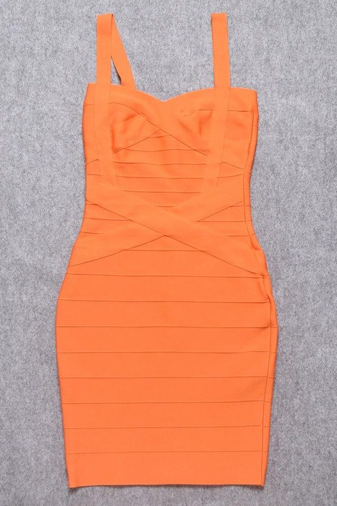 Woman wearing a figure flattering Heidi Bandage Mini Dress - Apricot Orange Bodycon Collection