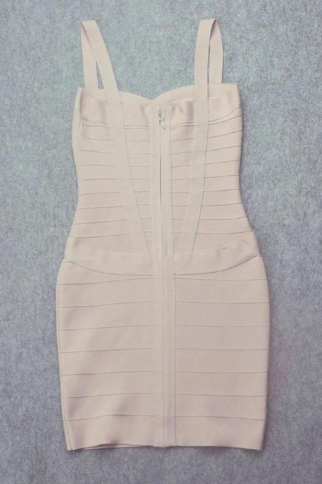 Woman wearing a figure flattering Heidi Bandage Mini Dress - Cream Bodycon Collection