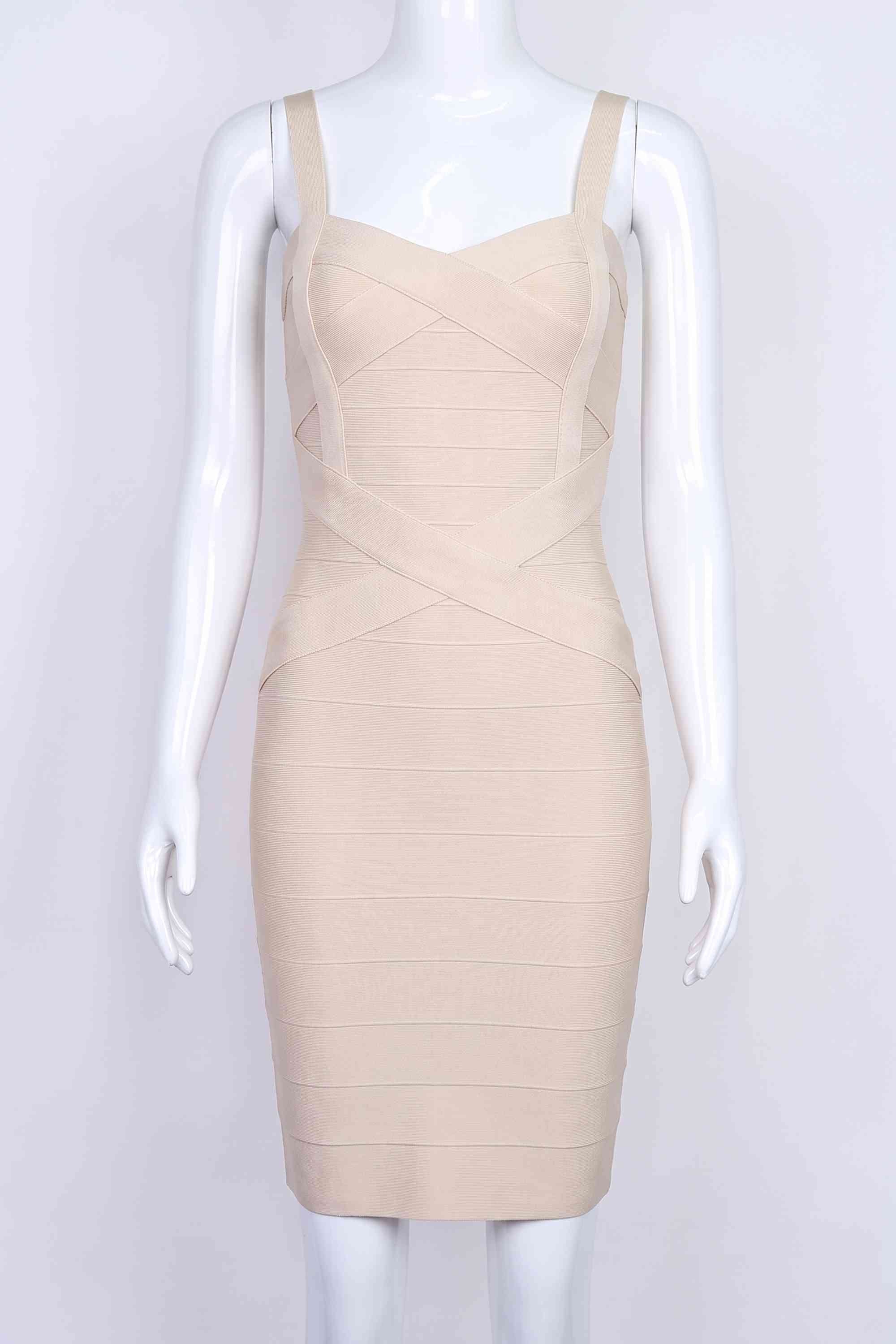 Woman wearing a figure flattering Heidi Bandage Mini Dress - Cream Bodycon Collection