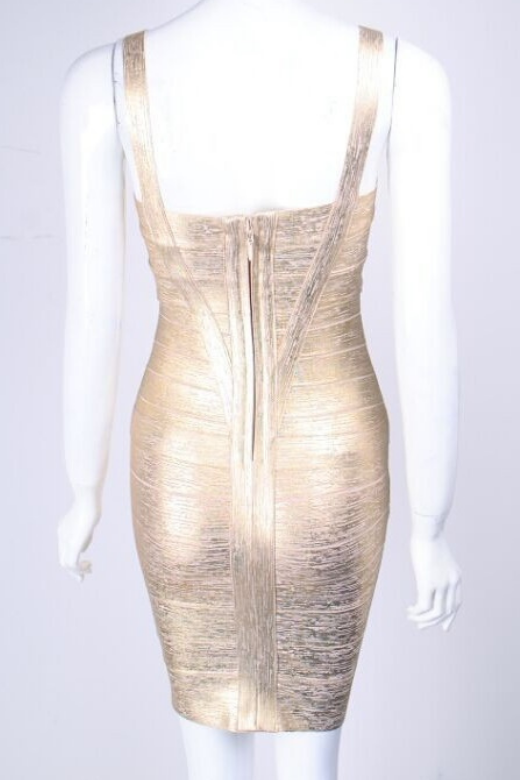 Woman wearing a figure flattering Heidi Bandage Mini Dress - Gold Bodycon Collection