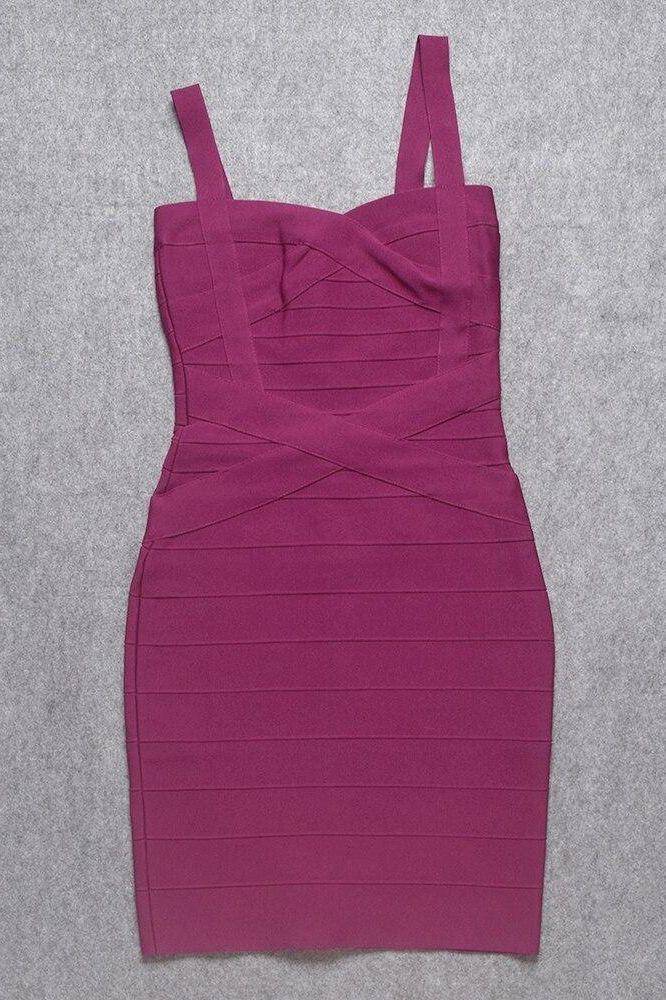 Woman wearing a figure flattering Heidi Bandage Mini Dress - Magenta Pink Bodycon Collection