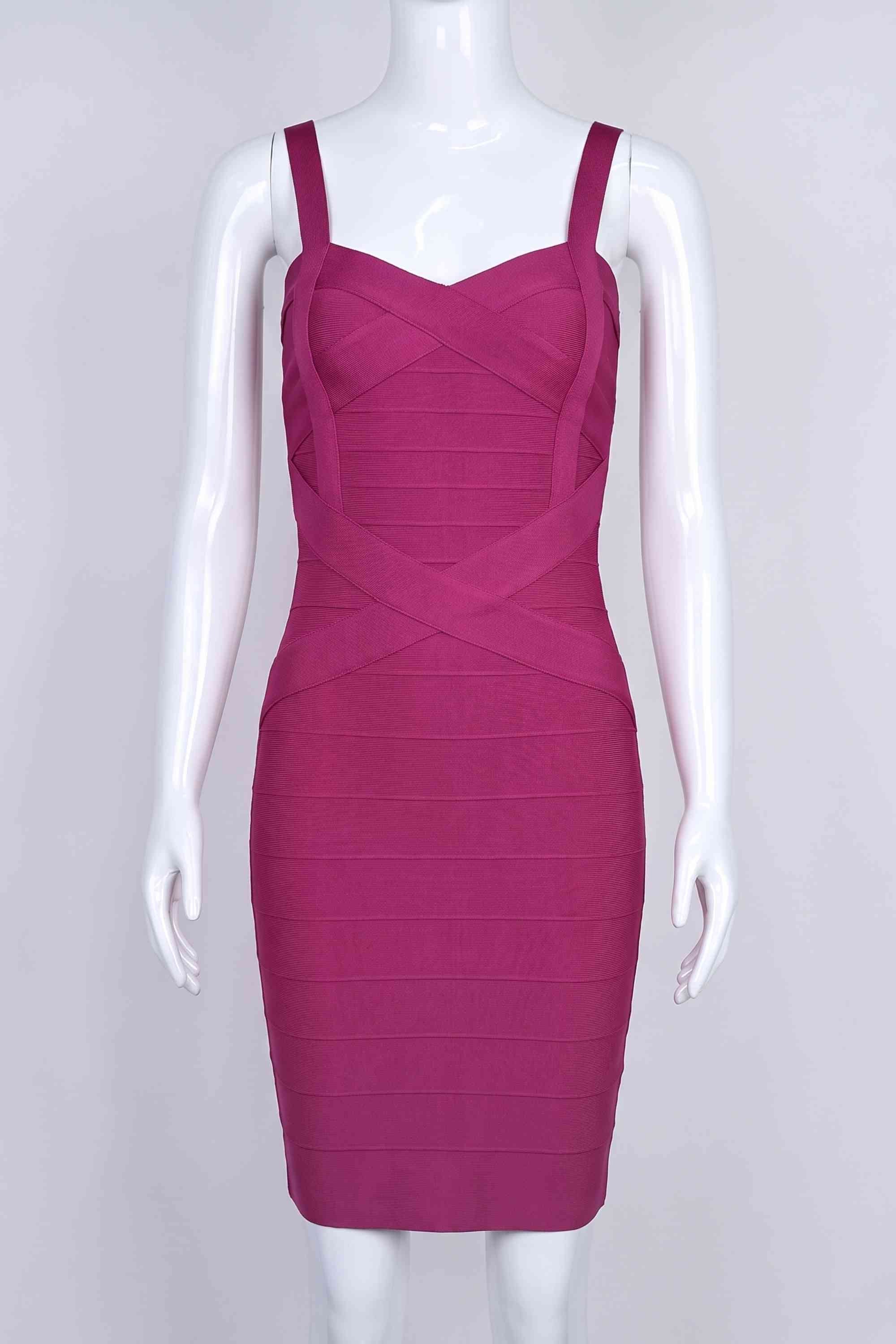 Woman wearing a figure flattering Heidi Bandage Mini Dress - Magenta Pink Bodycon Collection