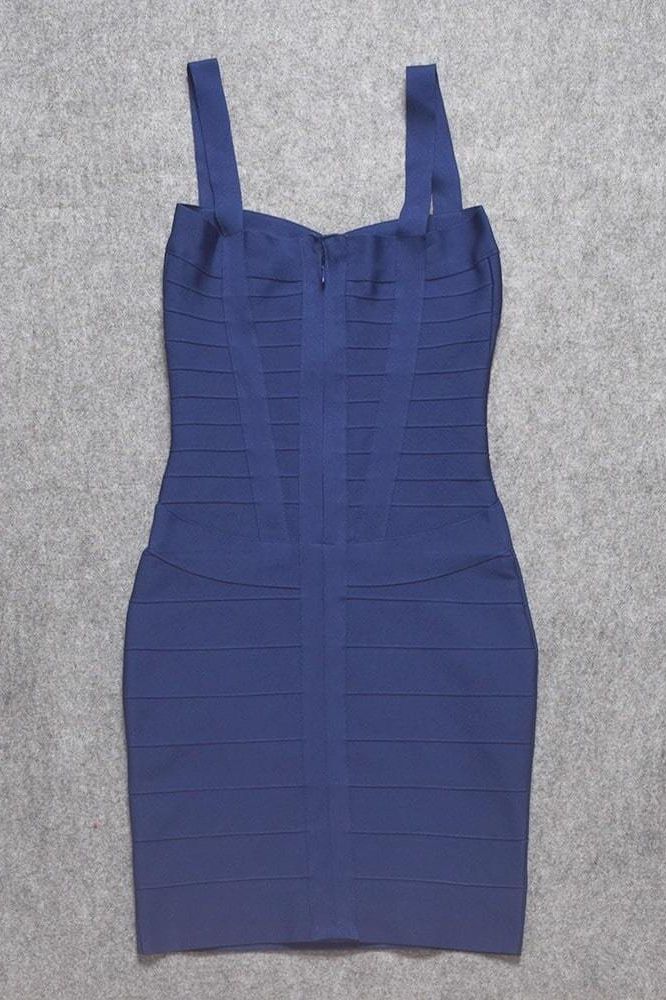 Woman wearing a figure flattering Heidi Bandage Mini Dress - Navy Blue Bodycon Collection