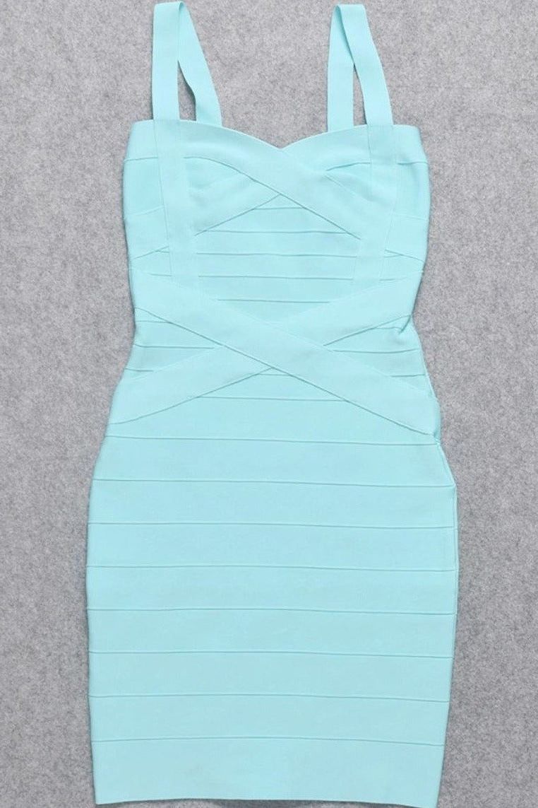 Woman wearing a figure flattering Heidi Bandage Mini Dress - Sky Blue Bodycon Collection
