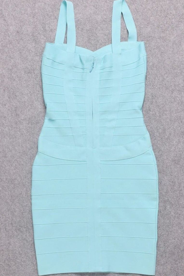 Woman wearing a figure flattering Heidi Bandage Mini Dress - Sky Blue Bodycon Collection