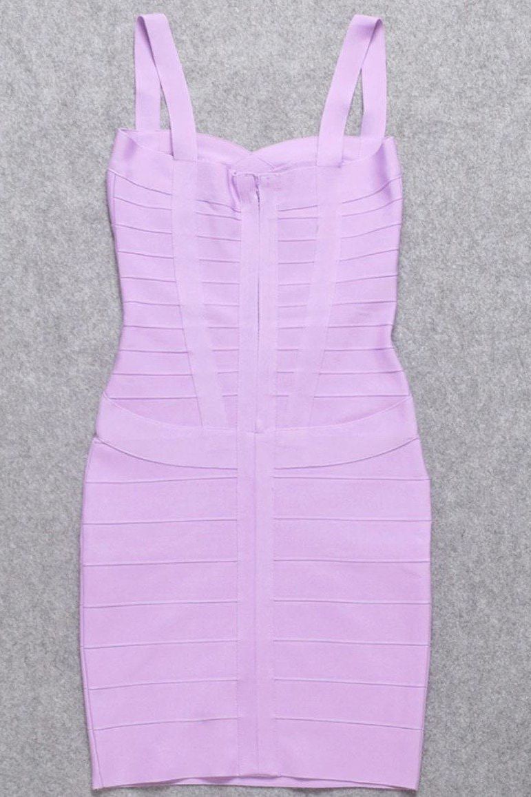 Woman wearing a figure flattering Heidi Bandage Mini Dress - Violet Bodycon Collection