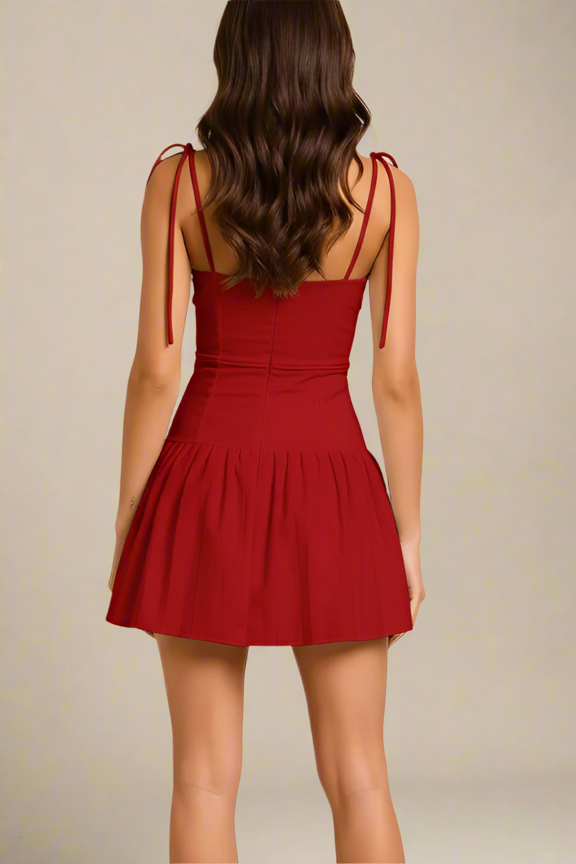 Woman wearing a figure flattering Vivien Bodycon Mini Dress - Lipstick Red BODYCON COLLECTION