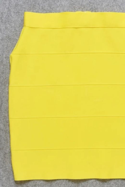 Woman wearing a figure flattering High Waist Bandage Mini Skirt - Sun Yellow BODYCON COLLECTION