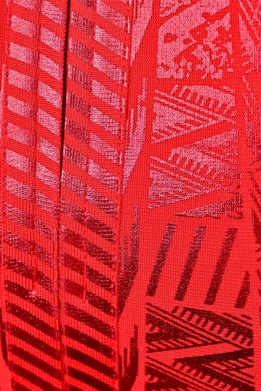 Woman wearing a figure flattering High Waist Metallic Leather Mini Skirt - Lipstick Red BODYCON COLLECTION