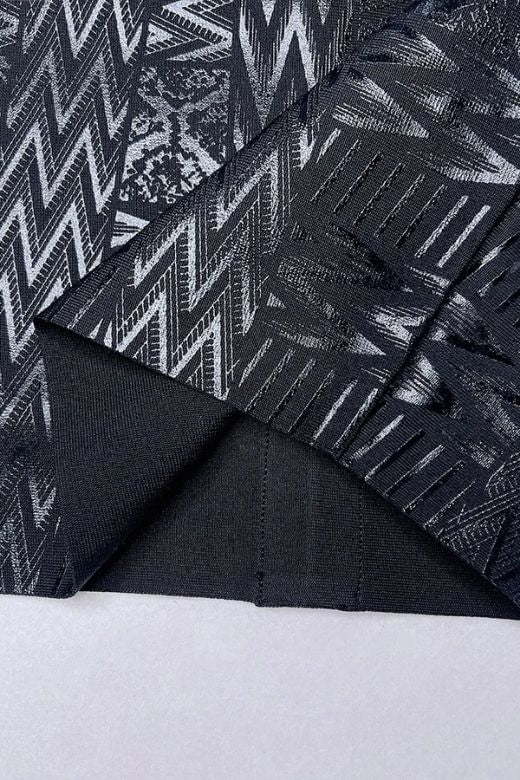 Woman wearing a figure flattering High Waist Metallic Mini Skirt - Classic Black BODYCON COLLECTION