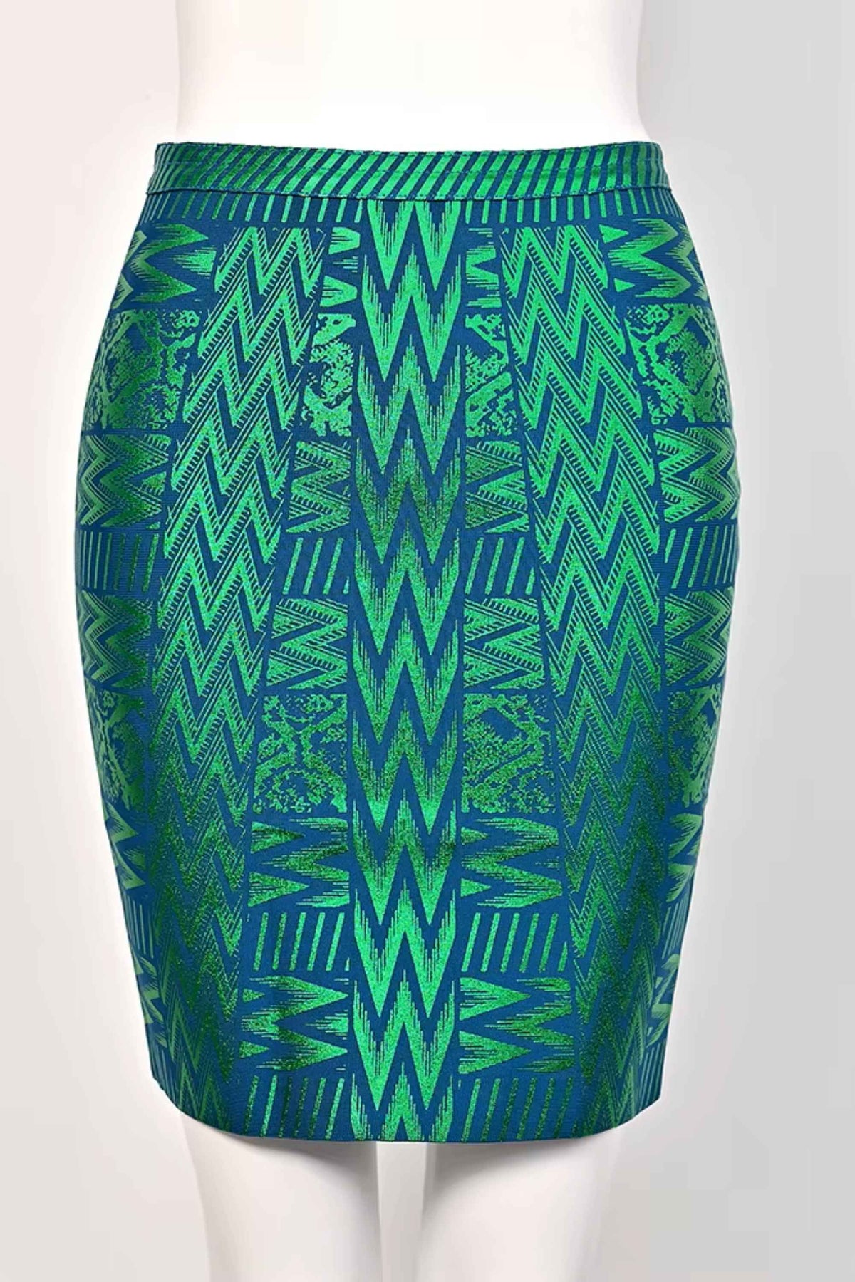 Woman wearing a figure flattering High Waist Metallic Mini Skirt - Emerald Green BODYCON COLLECTION