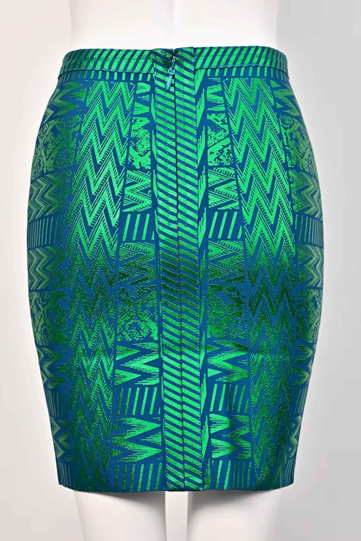 Woman wearing a figure flattering High Waist Metallic Mini Skirt - Emerald Green BODYCON COLLECTION