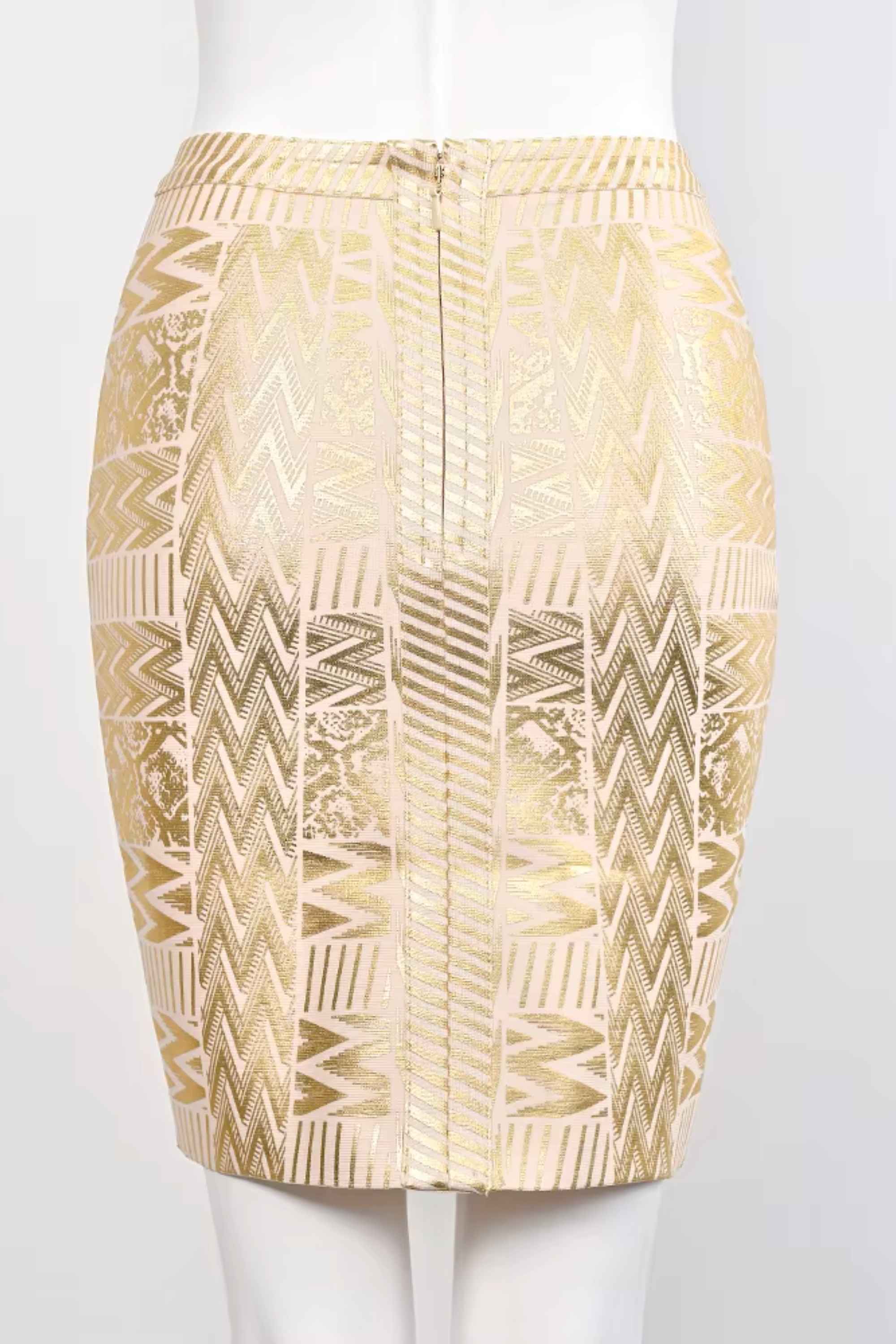 Woman wearing a figure flattering High Waist Metallic Mini Skirt - Gold BODYCON COLLECTION