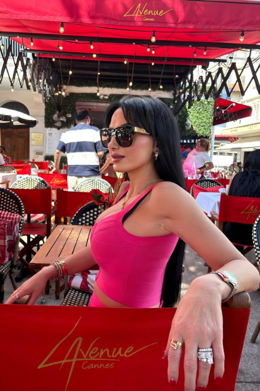 Woman wearing a figure flattering India Bandage Top and Mini Skirt Outfit Set - Hot Pink BODYCON COLLECTION