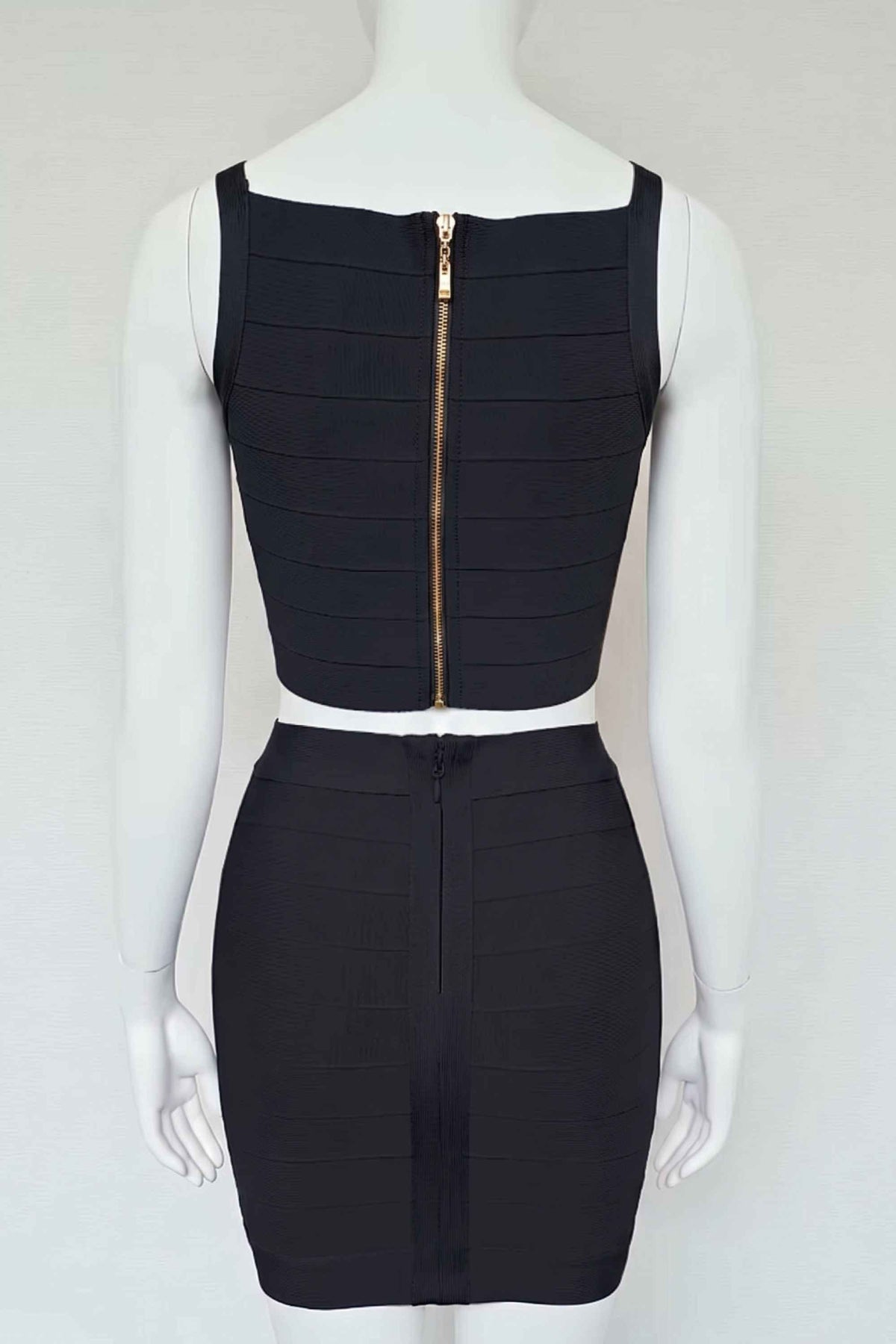 Woman wearing a figure flattering India Bandage Top and Mini Skirt Set - Classic Black BODYCON COLLECTION