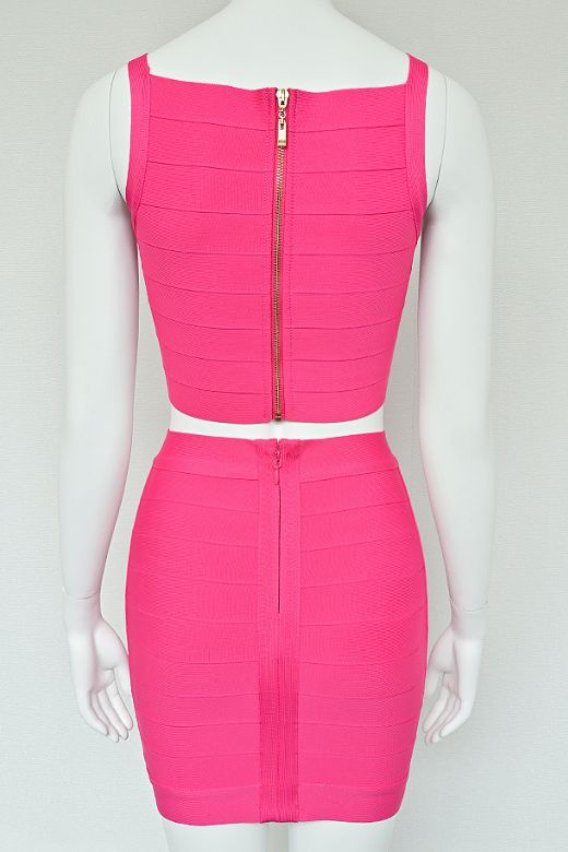 Woman wearing a figure flattering India Bandage Top and Mini Skirt Set - Hot Pink BODYCON COLLECTION