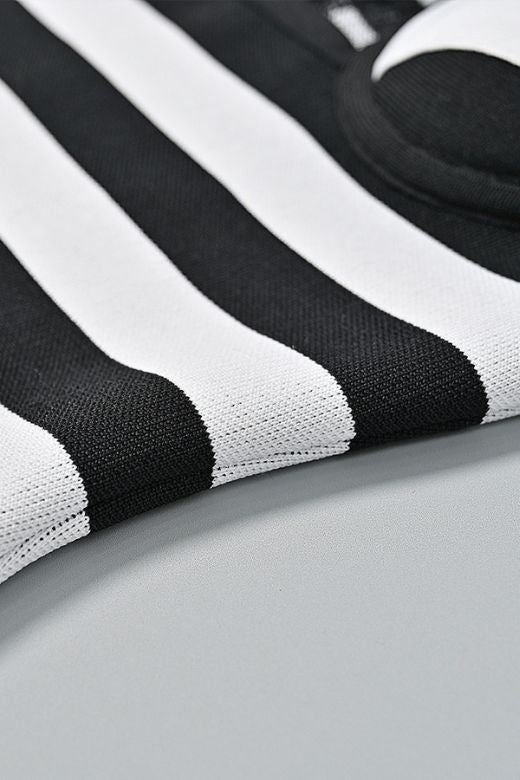 Woman wearing a figure flattering Ingrid Bandage Mini Dress - Classic Black BODYCON COLLECTION