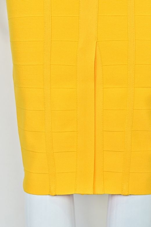 Woman wearing a figure flattering Isabella Bandage Midi Dress - Mustard Yellow BODYCON COLLECTION Pty Ltd