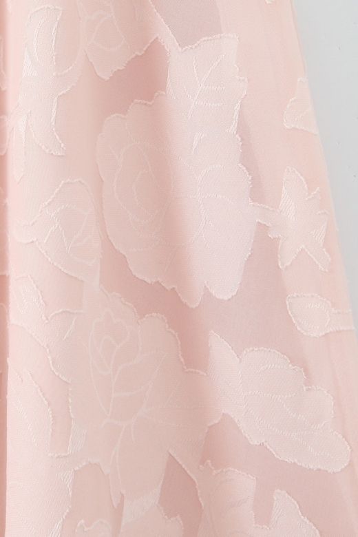 Woman wearing a figure flattering Ivy Bodycon Maxi Dress - Dusty Pink BODYCON COLLECTION