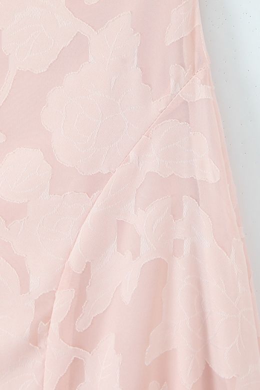 Woman wearing a figure flattering Ivy Bodycon Maxi Dress - Dusty Pink BODYCON COLLECTION