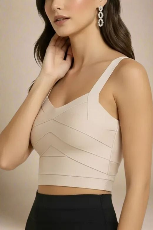 Woman wearing a figure flattering Jay Bandage Crop Top - Cream BODYCON COLLECTION