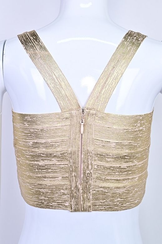 Woman wearing a figure flattering Jay Bandage Crop Top - Gold BODYCON COLLECTION